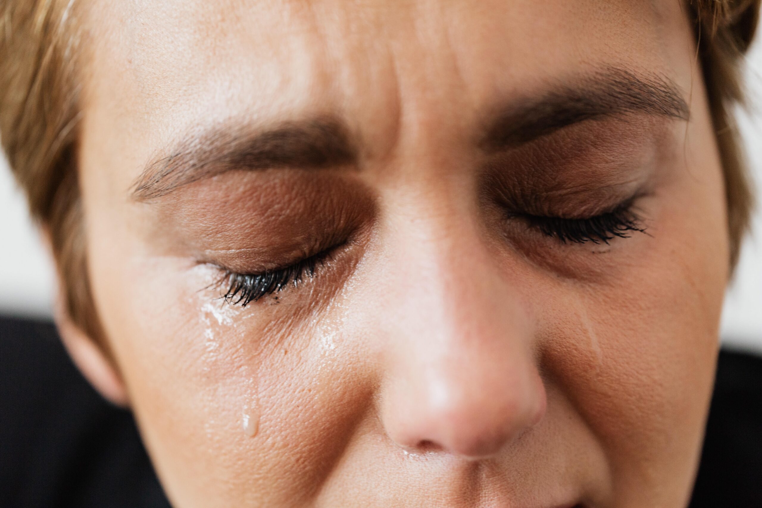 A woman crying because of depression.